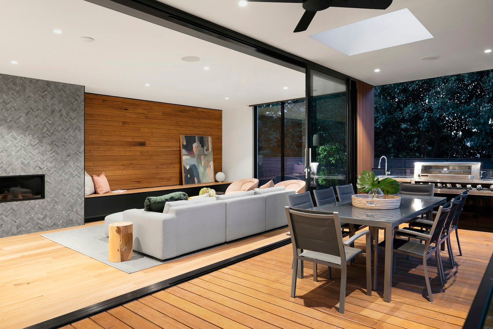 Bright open-plan home extension with bi-fold doors and skylight built by Aaron Hall Construction